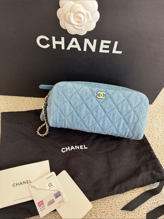 CHANEL Handbags - CHANEL Light Blue Quilted Denim Cosmetic Pouch with Chain Wristlet